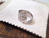 Adjustable wide band flower ring