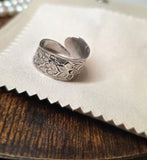 Adjustable wide band flower ring
