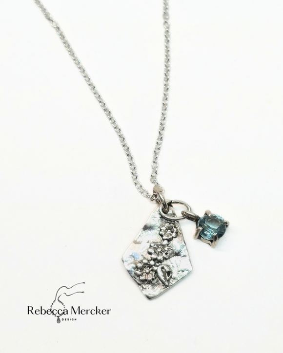 Sterling Silver And Blue Zircon Floral Necklace