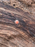 Orange spiney oyster charm