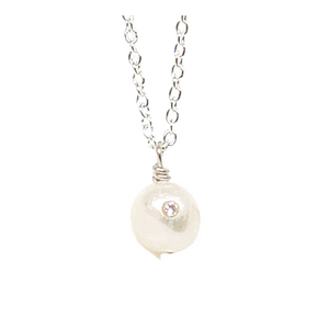 Freshwater pearl necklace encrusted with a clear white stone