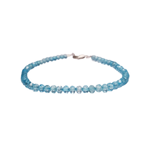 Natural faceted blue topaz, a bright sky blue stone. Central Florida jeweler. Handmade bracelet.