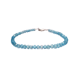 Natural faceted blue topaz, a bright sky blue stone. Central Florida jeweler. Handmade bracelet.